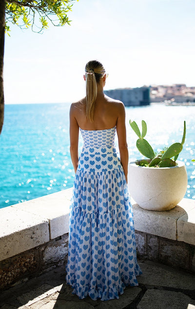 White shorts with blue heart print and ruffled sides, perfect for a fun vacation or casual summer day. - Image 52
