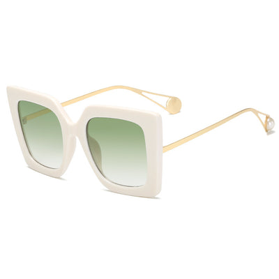 Women's black square frame sunglasses with blue gradient lenses and gold metal temples featuring a pearl accent. - Image 9