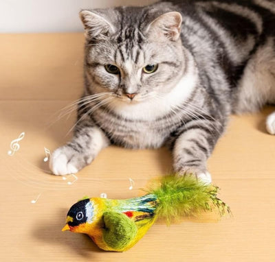 Colorful bird cat toy with green fluffy wings, black head, yellow face, orange beak, and spotted tail feathers. - Image 3