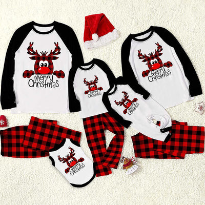 Family matching Christmas pajamas with a deer graphic and "Merry Christmas" text on white and black tops, paired with red and black buffalo plaid pants. - Image 11