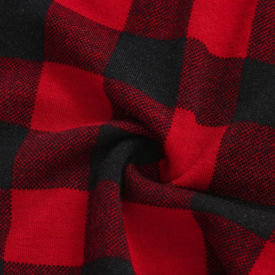 Kids' Christmas pajamas with a black long-sleeve top featuring a cartoon bear in a plaid scarf and ice skates, paired with red and black plaid pants. - Image 24