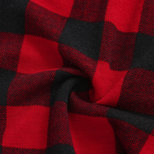 Kids' Christmas pajamas with a black long-sleeve top featuring a cartoon bear in a plaid scarf and ice skates, paired with red and black plaid pants. - Image 24