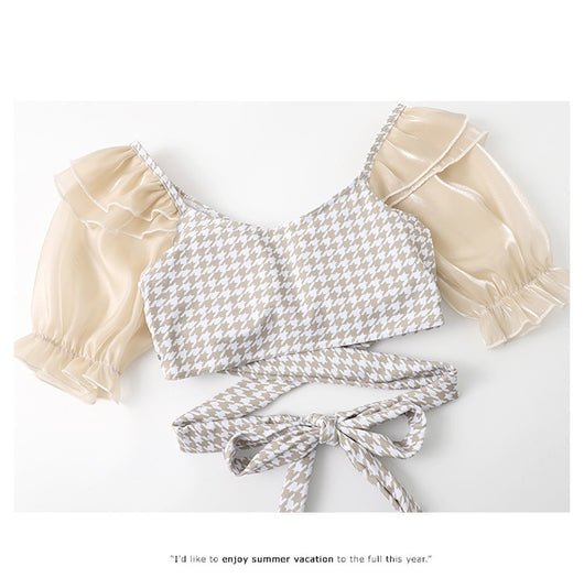 Women's conservative two-piece swimsuit with beige and white houndstooth pattern, sheer puff sleeves, and a flared skirt. - Image 21