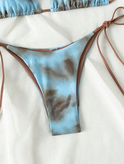 Women's two-piece bikini swimsuit with blue and neon yellow tie-dye pattern, featuring a triangle top and tie-side bottom. - Image 19