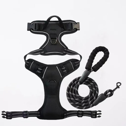Red and black dog harness with reflective strips, adjustable straps, and a top handle for secure pet control. - Image 33