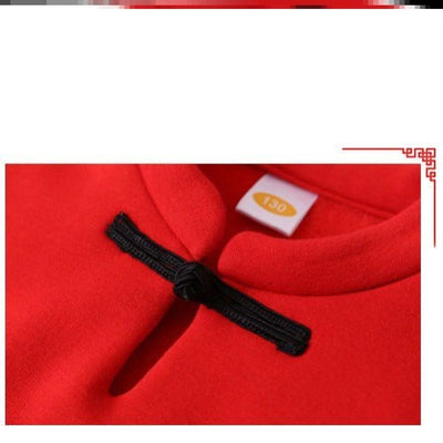 Family of four in matching red long-sleeve tops with a rabbit graphic, celebrating the Year of the Rabbit. - Image 7