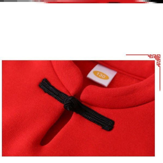 Family of four in matching red long-sleeve tops with a rabbit graphic, celebrating the Year of the Rabbit. - Image 7