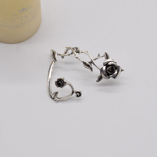 Aretes de Rosa Metalizada con Diseño Envuelto - Image 5