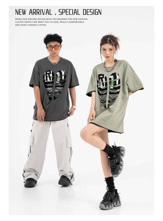 Camiseta Suelta con Detalles Rasgados y Costuras Decorativas - Image 12