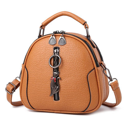 Bolso de Hombro Grande con Bandolera y Diseño Redondo Compacto - Image 10