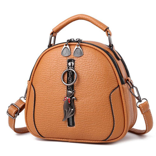 Bolso de Hombro Grande con Bandolera y Diseño Redondo Compacto - Image 10