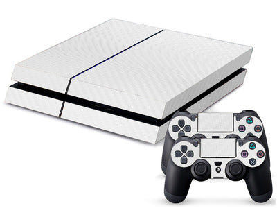 PS4 console and two controllers with a tan and beige carbon fiber sticker applied, featuring a woven pattern.