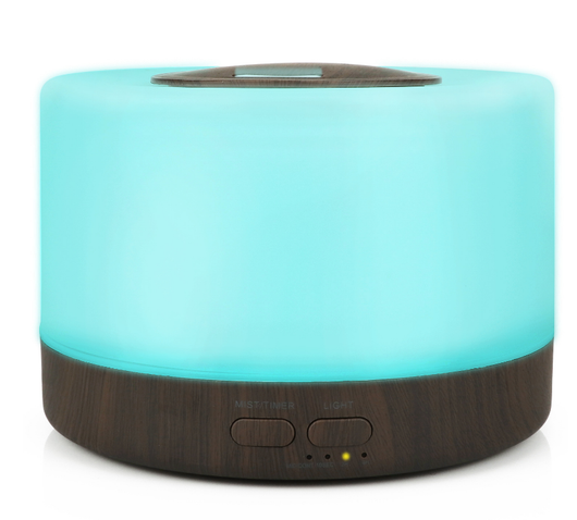 A cylindrical aromatherapy diffuser with a dark wood grain base and a translucent top glowing aqua blue, featuring control buttons. - Image 8