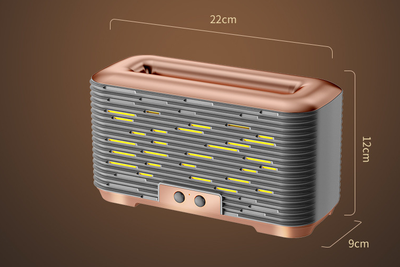 Rose gold and grey flame aroma diffuser and humidifier with horizontal slats and yellow LED lights. - Image 8