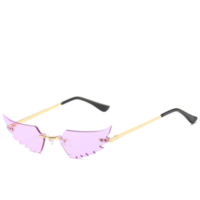 Purple wing-shaped rimless sunglasses with gold-colored metal arms and black ear tips on a white background. - Image 11