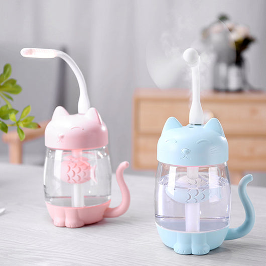 Pink cat-shaped USB humidifier with a clear body, decorative fish, and cute cat features like ears, paws, and tail. - Image 2