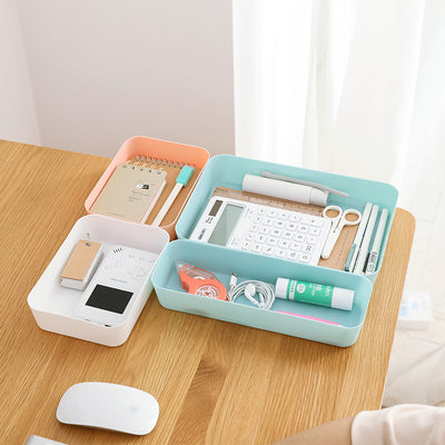 Teal rectangular plastic storage tray with an open top, ideal for organizing items on a desk or in a drawer. - Image 4