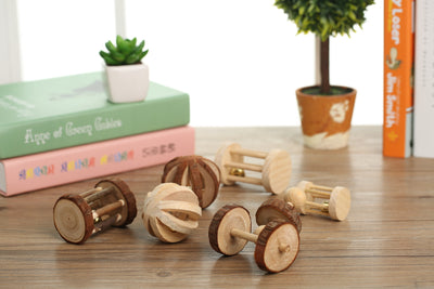 Set of natural wooden hamster toys including dumbbell shapes, a spherical bell toy, and two cylindrical bell toys, with a hamster. - Image 11