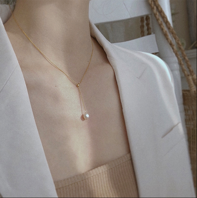 Cadena de suéter con perlas elegante
