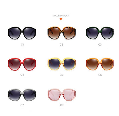 Oversize round sunglasses for women with olive frames, dark gradient lenses, and a gold emblem on the temples. - Image 4