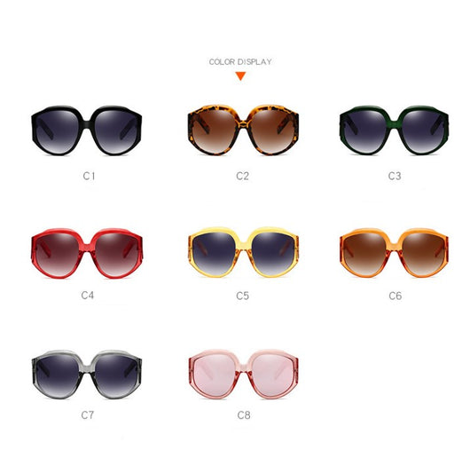 Oversize round sunglasses for women with olive frames, dark gradient lenses, and a gold emblem on the temples. - Image 4