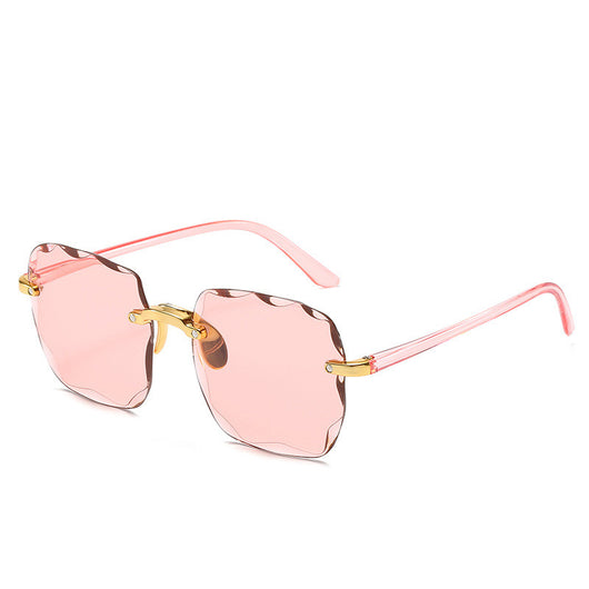 Pink rimless square sunglasses with wavy edges, gold-tone hardware, and clear pink temples on a white background. - Image 28