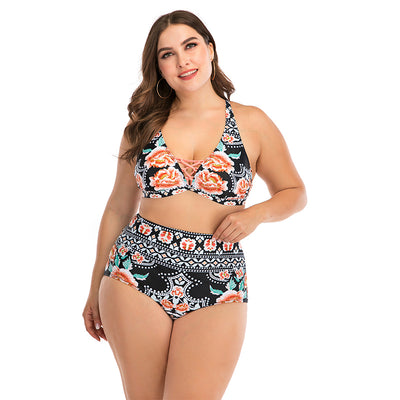 Plus size two-piece swimsuit with a black base, colorful geometric pattern, criss-cross top, and high-waisted bottom. - Image 3