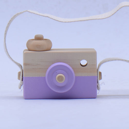 Two-tone wooden toy camera in natural wood and light blue with a cream fabric strap, for babies and kids. - Image 7