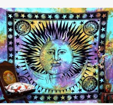 Black tapestry with a large central golden sun and white crescent moon, surrounded by celestial motifs and a decorative border.