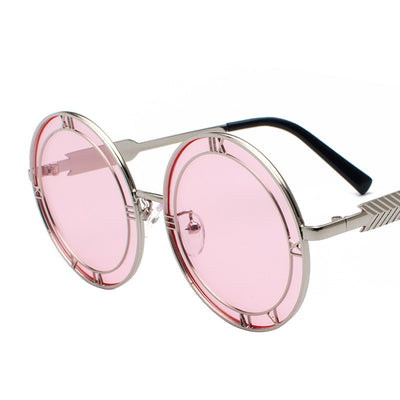 Round frame fashion sunglasses with light blue resin lenses and silver-tone metal frames featuring Roman numeral cutouts. - Image 13