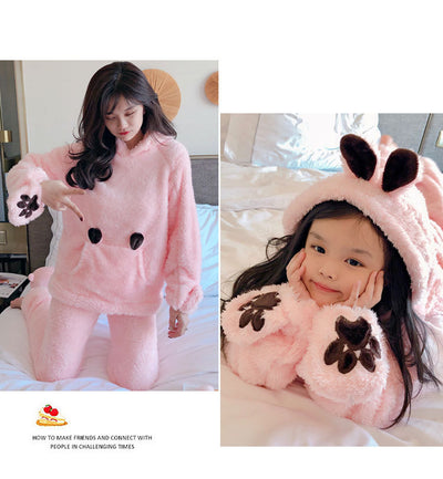 Mother and child wearing matching brown plush bear pajamas with hoods, ears, and embroidered paw gloves. - Image 13