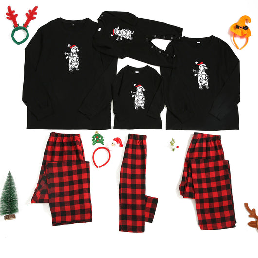 Family Christmas pajama set with grey long-sleeve tops featuring "Merry Christmas" and reindeer antlers, paired with red and black buffalo plaid pants. - Image 8