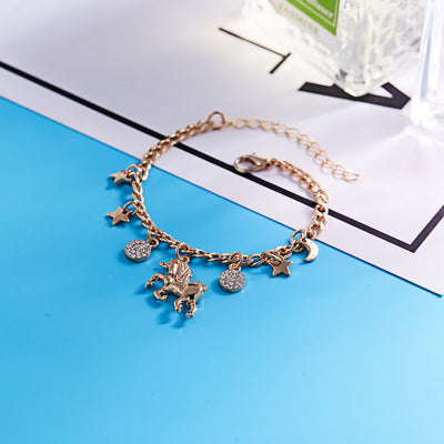 Pulsera de Charms Unicornio Plata y Oro con Luna y Estrellas - Regalo Anime para Niñas y Mujeres - Image 7