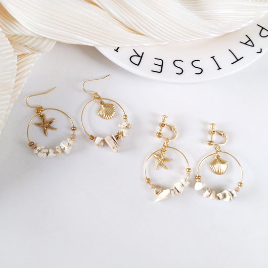 Aretes Estrella de Cinco Puntas en Metal Salvaje con Concha Marina - Image 2