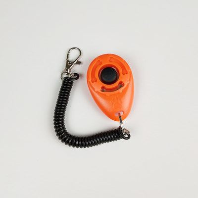 Turquoise dog training clicker with a black button and paw print, attached to a black coiled lanyard with a silver lobster clasp. - Image 7