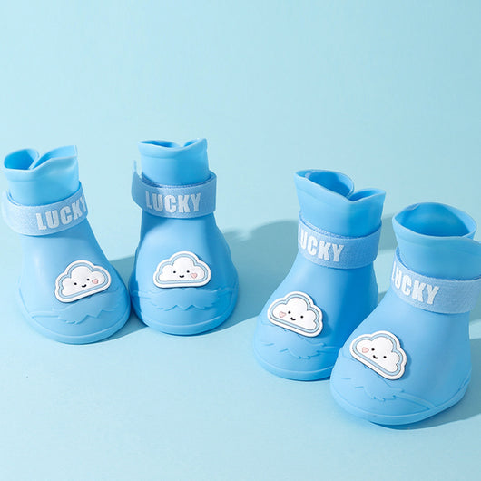 Four yellow silicone dog booties with a cartoon dog face emblem and "LUCKY" strap on a light blue background. - Image 9