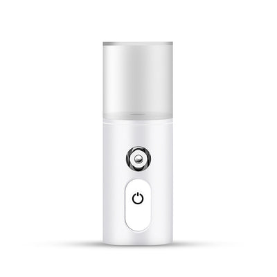 White portable facial humidifier with a clear water tank and a power button, for on-the-go moisturizing. - Image 7