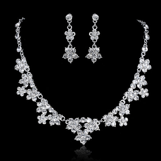 Silver-toned bridal tiara with clear rhinestones in a delicate floral and leaf design, perfect for weddings. - Image 3