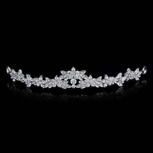 Silver-toned bridal tiara with clear rhinestones in a delicate floral and leaf design, perfect for weddings. - Image 2