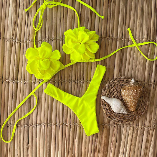 Neon yellow women's bikini with 3D floral details on the triangle top and a high-cut bottom.