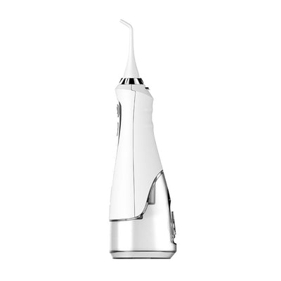 White portable electric water flosser with a clear water tank and silver control panel, standing upright. - Image 7
