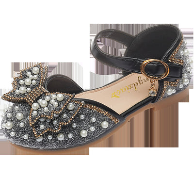 Beige girls' shallow mouth pumps with a large pink pearl bow, glitter, and an ankle strap with a gold buckle. - Image 6