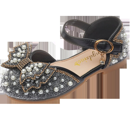 Beige girls' shallow mouth pumps with a large pink pearl bow, glitter, and an ankle strap with a gold buckle. - Image 6