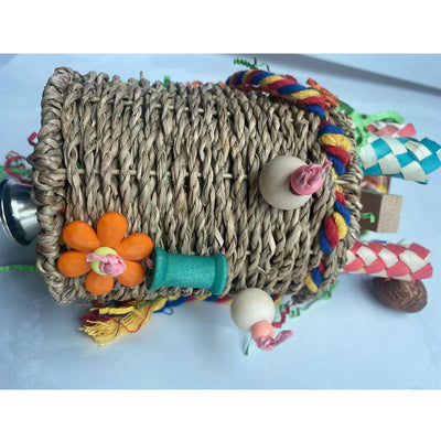 Colorful hanging bird toy with a woven grass basket, wooden beads, paper tubes, and shredded paper for parrots. - Image 3