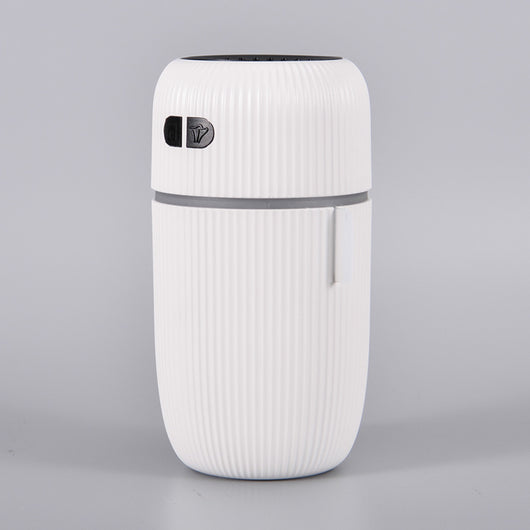 Black ribbed white noise humidifier with control buttons on top, designed to aid sleep and humidify. - Image 6