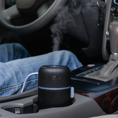 Black ribbed white noise humidifier with control buttons on top, designed to aid sleep and humidify. - Image 5