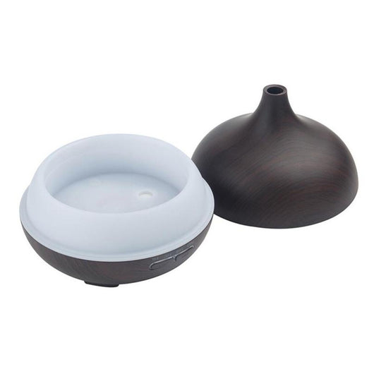 Wood grain ultrasonic aromatherapy diffuser and humidifier with a glowing blue LED light band and control buttons. - Image 5