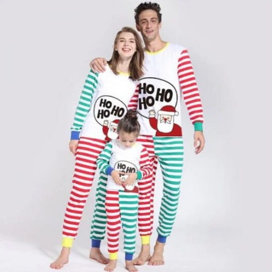 White Christmas parent-child pajama set with Santa Claus and "HO HO HO" graphic, featuring colorful striped sleeves and legs.