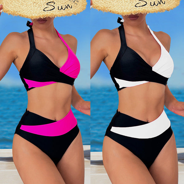 Black and white color-block halter bikini with high-waisted bottoms, modeled by a woman holding a straw hat.
