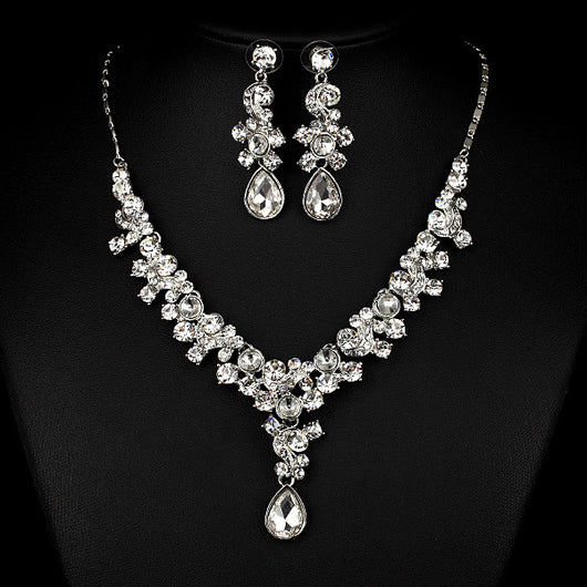 Pink and red rhinestone necklace and matching drop earrings set, featuring teardrop gems and floral scroll design. - Image 7